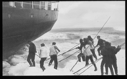 Image of Ship jammed. Men try to free her